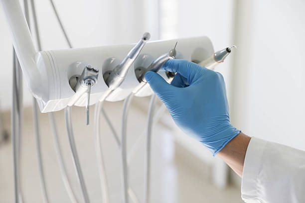 Professional Tooth Extraction technician working in Butler, IN